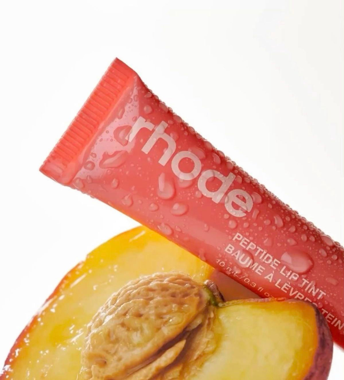 The Glossiest Peptide Lip Tint - Peach Pit